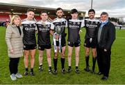 1 December 2019; Kilcoo brothers Aaron, Darryl, Aidan, Eugene, and Niall Brannigan along with their parents, Bridie and Eugene Brannigan celebrate with the Seamus McFerran cup after the AIB Ulster GAA Football Senior Club Championship Final match between Kilcoo and Naomh Conaill at Healy Park in Omagh, Tyrone. Photo by Oliver McVeigh/Sportsfile
