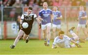 1 December 2019; Darryl Brannigan of Kilcoo shoots to score his side's third goal past the Naomh Conaill goalkeeper Stephen McGrath during the AIB Ulster GAA Football Senior Club Championship Final match between Kilcoo and Naomh Conaill at Healy Park in Omagh, Tyrone. Photo by Oliver McVeigh/Sportsfile