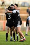 1 December 2019; Aidan Brannigan, Felim McGreevy, and Ryan Johnston of Kilcoo celebrate after the AIB Ulster GAA Football Senior Club Championship Final match between Kilcoo and Naomh Conaill at Healy Park in Omagh, Tyrone. Photo by Oliver McVeigh/Sportsfile