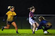 3 December 2019; Hannah O'Donoghue of UL scores her side's first goal of the game despite the efforts of Allison O'Sullivan of DCU during the Gourmet Food Parlour HEC Ladies Division 1 League Final match between Dublin City University and University of Limerick at Stradbally GAA, Co Laois. Photo by Eóin Noonan/Sportsfile