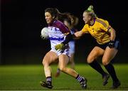 3 December 2019; Anna Galvin of UL in action against Victoria Wall of DCU during the Gourmet Food Parlour HEC Ladies Division 1 League Final match between Dublin City University and University of Limerick at Stradbally GAA, Co Laois. Photo by Eóin Noonan/Sportsfile