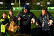 4 December 2019; Christy McElligott, coach, FAI Football For All, and Pearl Slattery, FAI Development Officer, talk with players during the FAI Getting Girls Active Programme at Crumlin United, Windmill Road, Dublin. Photo by Seb Daly/Sportsfile