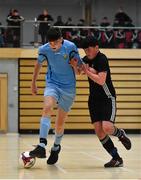 5 December 2019; Conor Cannon of Rice College, Westport, Co Mayo in action against Eoghan Murphy of St. Franics College, Rochestown, Co Cork during the match between St. Francis College and Rice College at the FAI Post Primary Schools Futsal National Finals in the WIT Arena, Waterford United. Photo by David Fitzgerald/Sportsfile