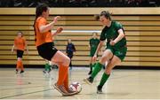 5 December 2019; Jane Murphy of Presentation Secondary School, Co Wexford in action against Aine Jordan of Scoil Mhuire Secondary School, Buncrana, Co Donegal during the match between Presentation SS Wexford and Scoil Mhuire SS Buncrana at the FAI Post Primary Schools Futsal National Finals in the WIT Arena, Waterford United. Photo by David Fitzgerald/Sportsfile