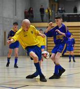 5 December 2019; Ben Murtagh of Patrician High School, Carrickmacross, Co Monaghan in action against Eamonn Armstrong of St. Mary's Diocesan School, Drogheda, Co Louth during the match between Patrician High School and St. Mary's Diocesan School at the FAI Post Primary Schools Futsal National Finals in the WIT Arena, Waterford United. Photo by David Fitzgerald/Sportsfile