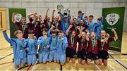 5 December 2019; The winning boys team Rice College, Westport, Co Mayo and the winning girls team Presentation Secondary School, Thurles, Co Tipperary, celebrate together following the FAI Post Primary Schools Futsal National Finals in the WIT Arena, Waterford United. Photo by David Fitzgerald/Sportsfile