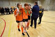 5 December 2019; Sorcha Doherty of Scoil Mhuire Secondary School, Buncrana, Co Donegal who sustained an injury is helped to get her medal by team-mates Aine Jordan, left, and Amy McBride Duncan following the FAI Post Primary Schools Futsal National Finals in the WIT Arena, Waterford United. Photo by David Fitzgerald/Sportsfile