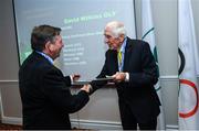6 December 2019; The OFI Athletes’ Commission are hosting the EOC Athletes Forum in Dublin this weekend. On the opening evening, Ronnie Delany, President of the Irish Olympians, presented OLY pins and a World Olympians Association certificate to David Wilkins OLY. Photo by Ramsey Cardy/Sportsfile