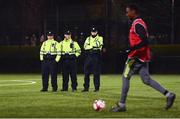6 December 2019; Members of An Garda Síochána watch the action during the Late Nite League Finals at Irishtown Stadium in Dublin. Photo by Harry Murphy/Sportsfile