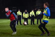 6 December 2019; Members of An Garda Síochána watch match action during the Late Nite League Finals at Irishtown Stadium in Dublin. Photo by Harry Murphy/Sportsfile