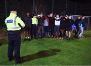 6 December 2019; A member of An Garda Síochána takes a picture of the Skerries team during the Late Nite League Finals at Irishtown Stadium in Dublin. Photo by Harry Murphy/Sportsfile