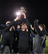 6 December 2019; Baldoyle captain Luke Corrigan lifts the trophy with team-mates during the Late Nite League Finals at Irishtown Stadium in Dublin. Photo by Harry Murphy/Sportsfile