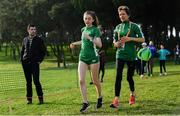 7 December 2019; Aoife O'Cuill of Ireland, and Niamh O'Sullivan, U20 Team Manager, ahead of the start of the European Cross Country Championships 2019 at Bela Vista Park in Lisbon, Portugal. Photo by Sam Barnes/Sportsfile