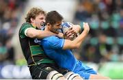 7 December 2019; Ross Byrne of Leinster is tackled by Jamie Gibson of Northampton Saints during the Heineken Champions Cup Pool 1 Round 3 match between Northampton Saints and Leinster at Franklins Gardens in Northampton, England. Photo by Ramsey Cardy/Sportsfile