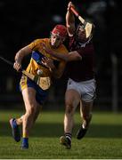 7 December 2019; Niall Deasy of Clare in action against Sean Linnane of Galway during the Inter-county challenge match between Galway and Clare at Ballinderreen GAA Club in Muggaunagh, Co. Galway. Photo by David Fitzgerald/Sportsfile