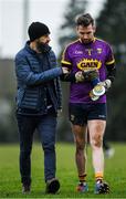 7 December 2019; Wexford manager Paul Galvin in conversation with goalkeeper Pat Doyle as the make their way off the field for the half time break during the 2020 O'Byrne Cup Round 1 match between Wexford and Westmeath at St. Patrick's Park in Enniscorthy, Wexford. Photo by Ray McManus/Sportsfile