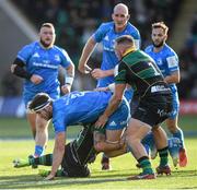 7 December 2019; Caelan Doris of Leinster is tackled by Matt Proctor, left, and Alex Waller of Northampton Saints during the Heineken Champions Cup Pool 1 Round 3 match between Northampton Saints and Leinster at Franklins Gardens in Northampton, England. Photo by Ramsey Cardy/Sportsfile