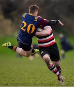 10 February 2019; Lorcan Jones of Skerries attempts to stop the progress of Daniel Pim of Enniscorthy during the Bank of Ireland Provincial Towns Cup Round 2 match between Skerries RFC and Enniscorthy RFC at Skerries RFC in Skerries, Dublin. Photo by Brendan Moran/Sportsfile