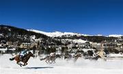 17 February 2019; Runners and riders compete in the Longines 80 Grosser Preis von St. Moritz flat race at the White Turf horse racing event at St Moritz, Switzerland. Photo by Ramsey Cardy/Sportsfile