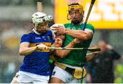 16 June 2019; Tom Morrissey of Limerick is shouldered over the sideline by Brendan Maher and Sean O’Brien of Tipperary during the Munster GAA Hurling Senior Championship Round 5 match between Tipperary and Limerick in Semple Stadium in Thurles, Co. Tipperary. Photo by Diarmuid Greene/Sportsfile