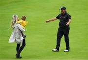 21 July 2019; Shane Lowry of Ireland celebrates with his wife Wendy Honner and daughter Iris after winning The Open Championship on Day Four of the 148th Open Championship at Royal Portrush in Portrush, Co Antrim. Photo by Brendan Moran/Sportsfile
