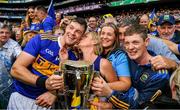 18 August 2019; Tipperary captain Séamus Callanan is congratulated by his mother Mary and dad John, sister Fiona, and his brother John also with the Liam MacCarthy Cup after the GAA Hurling All-Ireland Senior Championship Final match between Kilkenny and Tipperary at Croke Park in Dublin. Photo by Ray McManus/Sportsfile