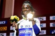 3 October 2019; Dina Asher-Smith of Great Britain with her Gold medal after competing in the Women's 200m Final during day seven of the 17th IAAF World Athletics Championships Doha 2019 at the Khalifa International Stadium in Doha, Qatar. Photo by Sam Barnes/Sportsfile