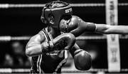 20 November 2019; (EDITORS NOTE: Image has been shot in black and white. Color version not available.) Sara Haghighat-joo of St Brigids, Edenderry, Co Offaly, is punched by Shauna Blaney of Navan, Co Meath, in their 54kg bout during the IABA Irish National Elite Boxing Championships at the National Stadium in Dublin. Photo by Piaras Ó Mídheach/Sportsfile