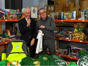 8 December 2019; Republic of Ireland manager Mick McCarthy was on hand today to hand over Republic of Ireland bags filled with jerseys, footballs, scarfs & other merchandise to Liam Casey, East Region President, St Vincent De Paul, at the St Vincent De Paul depot on Sean McDermott Street, Summerhill, Dublin. The gifts are part of an annual Christmas donation for families in need. Photo by Seb Daly/Sportsfile