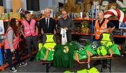8 December 2019; Republic of Ireland manager Mick McCarthy was on hand today to hand over Republic of Ireland bags filled with jerseys, footballs, scarfs & other merchandise to Liam Casey, centre, East Region President, St Vincent De Paul, at the St Vincent De Paul depot on Sean McDermott Street, Summerhill, Dublin. The gifts are part of an annual Christmas donation for families in need. Pictured are Republic of Ireland manager Mick McCarthy, Liam Casey, East Region President, St Vincent De Paul, and corporate volunteers from Electric Ireland, at the St Vincent De Paul depot on Sean McDermott Street, Summerhill, Dublin. Photo by Seb Daly/Sportsfile