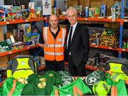 8 December 2019; Republic of Ireland manager Mick McCarthy was on hand today to hand over Republic of Ireland bags filled with jerseys, footballs, scarfs & other merchandise to St Vincent De Paul staff, at the St Vincent De Paul depot on Sean McDermott Street, Summerhill, Dublin. The gifts are part of an annual Christmas donation for families in need. Pictured are Republic of Ireland manager Mick McCarthy, right, and Christmas Project Worker Colm Kelly, at the St Vincent De Paul depot on Sean McDermott Street, Summerhill, Dublin. Photo by Seb Daly/Sportsfile