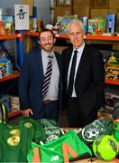 8 December 2019; Republic of Ireland manager Mick McCarthy was on hand today to hand over Republic of Ireland bags filled with jerseys, footballs, scarfs & other merchandise to St Vincent De Paul staff, at the St Vincent De Paul depot on Sean McDermott Street, Summerhill, Dublin. The gifts are part of an annual Christmas donation for families in need. Pictured are Republic of Ireland manager Mick McCarthy, right, and corporate volunteer Pol O Murchu, AIB Swoards, at the St Vincent De Paul depot on Sean McDermott Street, Summerhill, Dublin. Photo by Seb Daly/Sportsfile