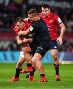 7 December 2019; CJ Stander of Munster is tackled by Richard Barrington of Saracens during the Heineken Champions Cup Pool 4 Round 3 match between Munster and Saracens at Thomond Park in Limerick. Photo by Seb Daly/Sportsfile