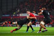 7 December 2019; JJ Hanrahan of Munster is tackled by Ben Earl, left, and Will Skelton of Saracens during the Heineken Champions Cup Pool 4 Round 3 match between Munster and Saracens at Thomond Park in Limerick. Photo by Seb Daly/Sportsfile