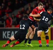7 December 2019; Chris Farrell of Munster is tackled by Brad Barritt, left, and Manu Vunipola of Saracens of Saracens during the Heineken Champions Cup Pool 4 Round 3 match between Munster and Saracens at Thomond Park in Limerick. Photo by Seb Daly/Sportsfile