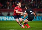 7 December 2019; Rory Scannell of Munster in action against Brad Barritt of Saracens during the Heineken Champions Cup Pool 4 Round 3 match between Munster and Saracens at Thomond Park in Limerick. Photo by Seb Daly/Sportsfile