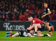 7 December 2019; Ben Spencer of Saracens is tackled by Rory Scannell of Munster during the Heineken Champions Cup Pool 4 Round 3 match between Munster and Saracens at Thomond Park in Limerick. Photo by Seb Daly/Sportsfile