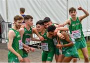 8 December 2019; The Ireland Men's U20 team, from left, Thomas McStay, Jamie Battle, Daragh McElhinney, Keelan Kilrehill, Efrem Gidey and Shay McEvoy celebrate winning a medal after competing in the Men's U20 event during the European Cross Country Championships 2019 at Bela Vista Park in Lisbon, Portugal. Photo by Sam Barnes/Sportsfile