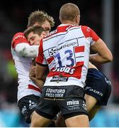 8 December 2019; Kyle Godwin of Connacht is tackled by Louis Rees-Zammit, left, and Chris Harris of Gloucester during the Heineken Champions Cup Pool 5 Round 3 match between Gloucester and Connacht at Kingsholm Stadium in Gloucester, England. Photo by Ramsey Cardy/Sportsfile