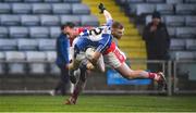 8 December 2019; Alan Flood of Ballyboden St Endas is tackled by Mark Fitzgerald of Éire Óg during the AIB Leinster GAA Football Senior Club Championship Final between Eire Óg Carlow and Ballyboden St. Enda's GAA at MW Hire O'Moore Park in Portlaoise, Co. Laois. Photo by David Fitzgerald/Sportsfile