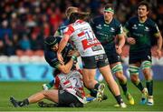 8 December 2019; Ultan Dillane of Connacht is tackled by Franco Marais, left, and Josh Hohneck of Gloucester during the Heineken Champions Cup Pool 5 Round 3 match between Gloucester and Connacht at Kingsholm Stadium in Gloucester, England. Photo by Ramsey Cardy/Sportsfile