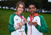 8 December 2019; Stephanie Cotter of Ireland with her individual bronze medal, from the Women's U23 event, and Efrem Gidey of Ireland with his bronze medal, from the U20 Men's event, during the European Cross Country Championships 2019 at Bela Vista Park in Lisbon, Portugal. Photo by Sam Barnes/Sportsfile