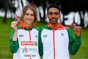 8 December 2019; Stephanie Cotter of Ireland with her individual bronze medal, from the Women's U23 event, and Efrem Gidey of Ireland with his bronze medal, from the U20 Men's event, during the European Cross Country Championships 2019 at Bela Vista Park in Lisbon, Portugal. Photo by Sam Barnes/Sportsfile