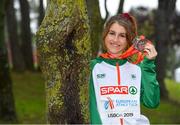 8 December 2019; Stephanie Cotter of Ireland poses for a photo with her team silver and individual bronze medal from the Women's U23 event during the European Cross Country Championships 2019 at Bela Vista Park in Lisbon, Portugal. Photo by Sam Barnes/Sportsfile