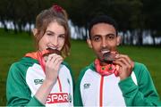 8 December 2019; Stephanie Cotter of Ireland with her individual bronze medal, from the Women's U23 event, and Efrem Gidey of Ireland with his bronze medal, from the U20 Men's event, during the European Cross Country Championships 2019 at Bela Vista Park in Lisbon, Portugal. Photo by Sam Barnes/Sportsfile
