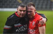 8 December 2019; Jordan Lowry of Éire Óg is consoled by selector Gerry McGill following the AIB Leinster GAA Football Senior Club Championship Final between Eire Óg Carlow and Ballyboden St. Enda's GAA at MW Hire O'Moore Park in Portlaoise, Co. Laois. Photo by David Fitzgerald/Sportsfile