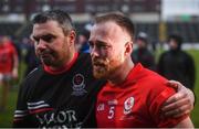 8 December 2019; Jordan Lowry of Éire Óg is consoled by selector Gerry McGill following the AIB Leinster GAA Football Senior Club Championship Final between Eire Óg Carlow and Ballyboden St. Enda's GAA at MW Hire O'Moore Park in Portlaoise, Co. Laois. Photo by David Fitzgerald/Sportsfile