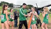 8 December 2019; Aoibhe Richardson, left, Fionnuala Ross, second left, Fionnuala McCormack, centre, and Mary Mulhare, all of Ireland, celebrate with physio Declan Monaghan after winning team silver in the Senior Women's event during the European Cross Country Championships 2019 at Bela Vista Park in Lisbon, Portugal. Photo by Sam Barnes/Sportsfile