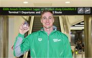 9 December 2019; Shane Ryan of Ireland with his bronze medal, from the Men’s 50m Backstroke, on his return from the European Short Course Swimming Championships 2019 in Scotland at Dublin Airport in Dublin. Photo by Piaras Ó Mídheach/Sportsfile