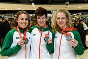 9 December 2019; Members of the silver medal winning senior women's team, from left, Aoibhe Richardson, Una Britton, and Mary Mulhare during the Ireland European Cross Country Team Homecoming at Dublin Airport in Dublin. Photo by Piaras Ó Mídheach/Sportsfile
